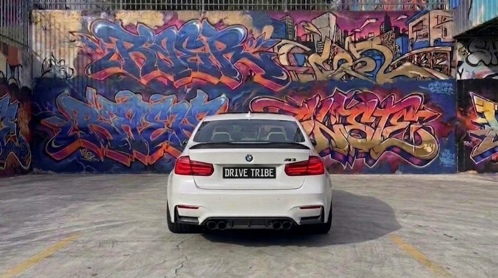 White 2016 BMW M3 Competition F80 Stage 1, rear view, available for hire in Sydney