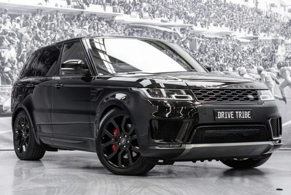 Black 2022 Land Rover Range Rover Sport, front three-quarter view, available for hire in Sydney