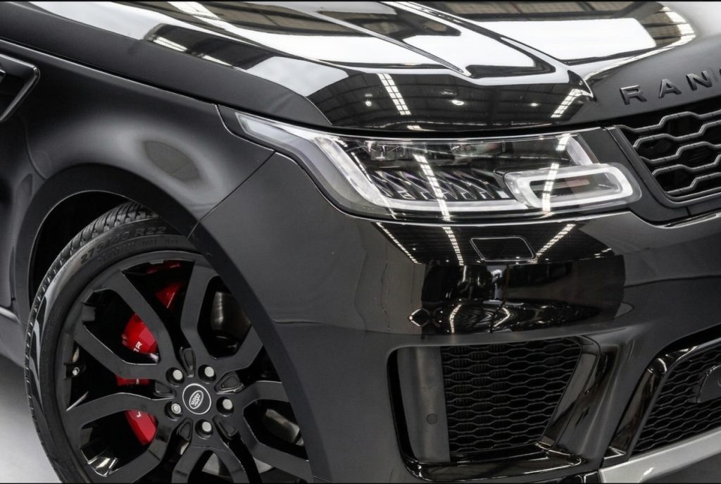 Headlight of the black 2022 Land Rover Range Rover Sport, available for hire in Sydney