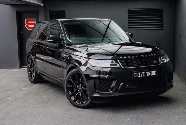 Black 2020 Land Rover Range Rover Sport 7-Seat, front three-quarter view, available for hire in Sydney