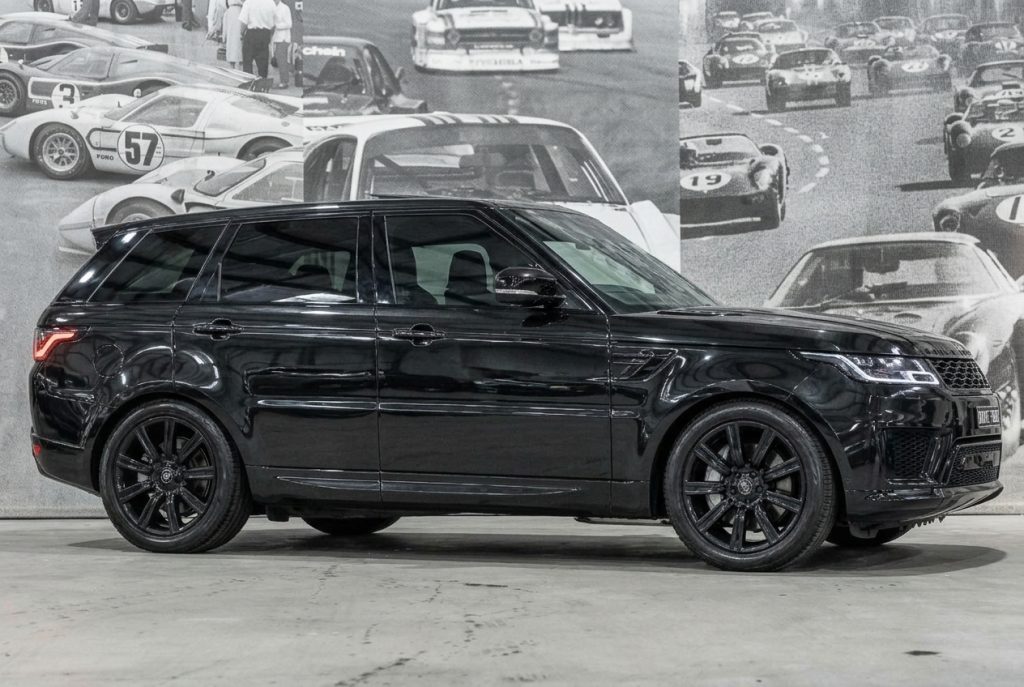 Black 2020 Land Rover Range Rover Sport 7-Seat, side profile, available for hire in Sydney
