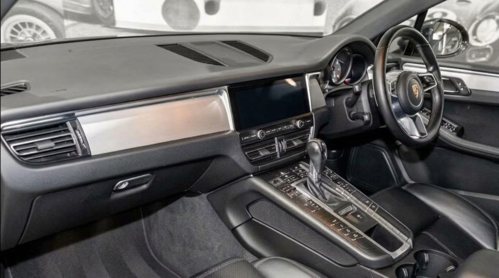 Dashboard of the grey 2019 Porsche Macan, available for hire in Sydney