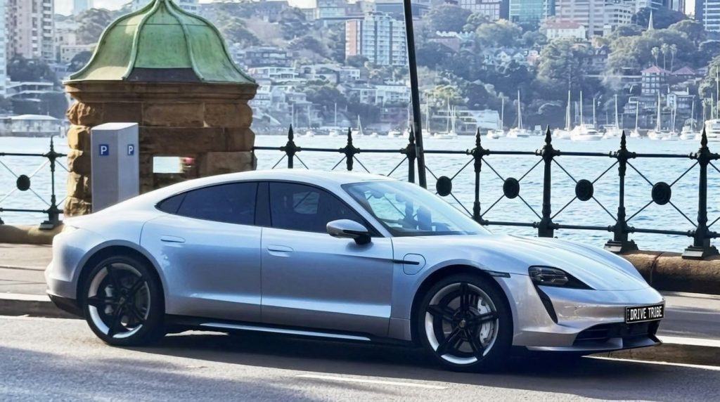 Silver 2021 Porsche Taycan Turbo, side profile, available for hire in Sydney