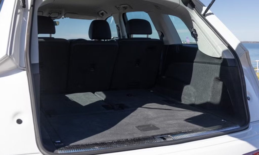 Boot space of the white 2021 Audi Q7 45 TDI quattro, available for hire in Sydney