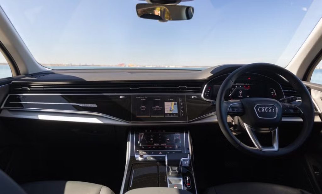Dashboard of the white 2021 Audi Q7 45 TDI quattro, available for hire in Sydney