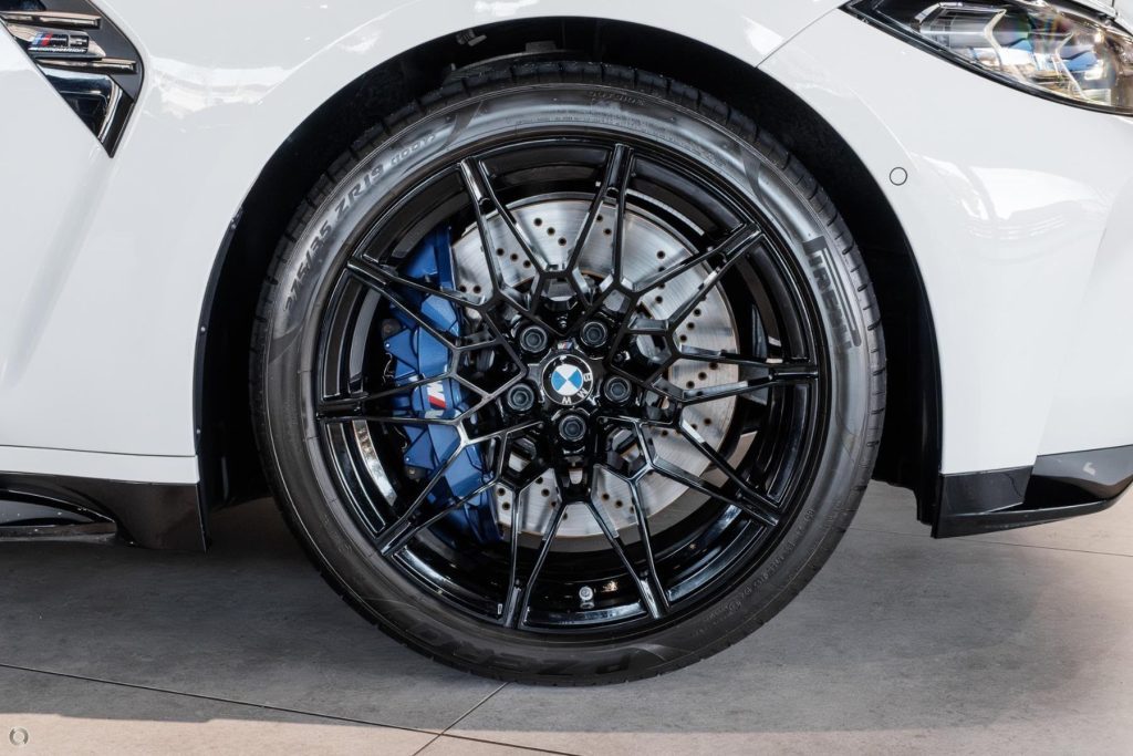 Wheel of the white 2024 BMW M3 Competition G80 xDrive, available for hire in Sydney