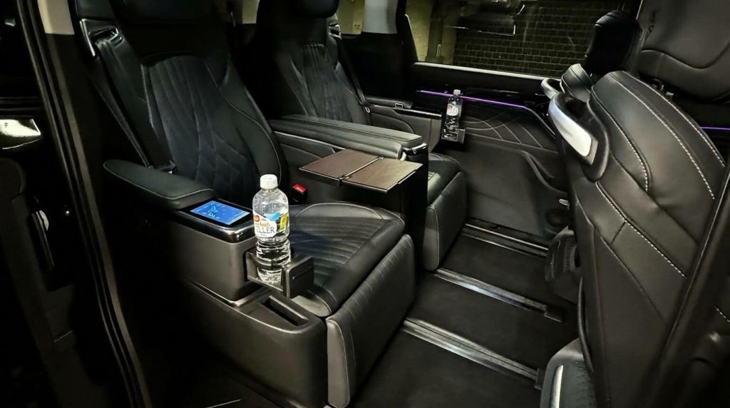 Rear seats of the black 2023 LDV MIFA Luxe, available for hire in Sydney