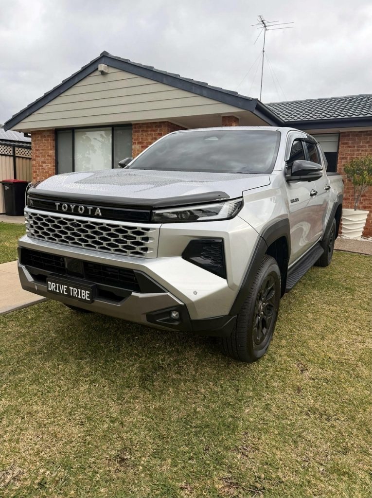 Silver 2026 Toyota HiLux Rogue 4x4, front three-quarter view, available for hire in Sydney