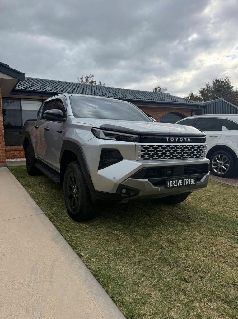 Silver 2026 Toyota HiLux Rogue 4x4, front three-quarter view, available for hire in Sydney