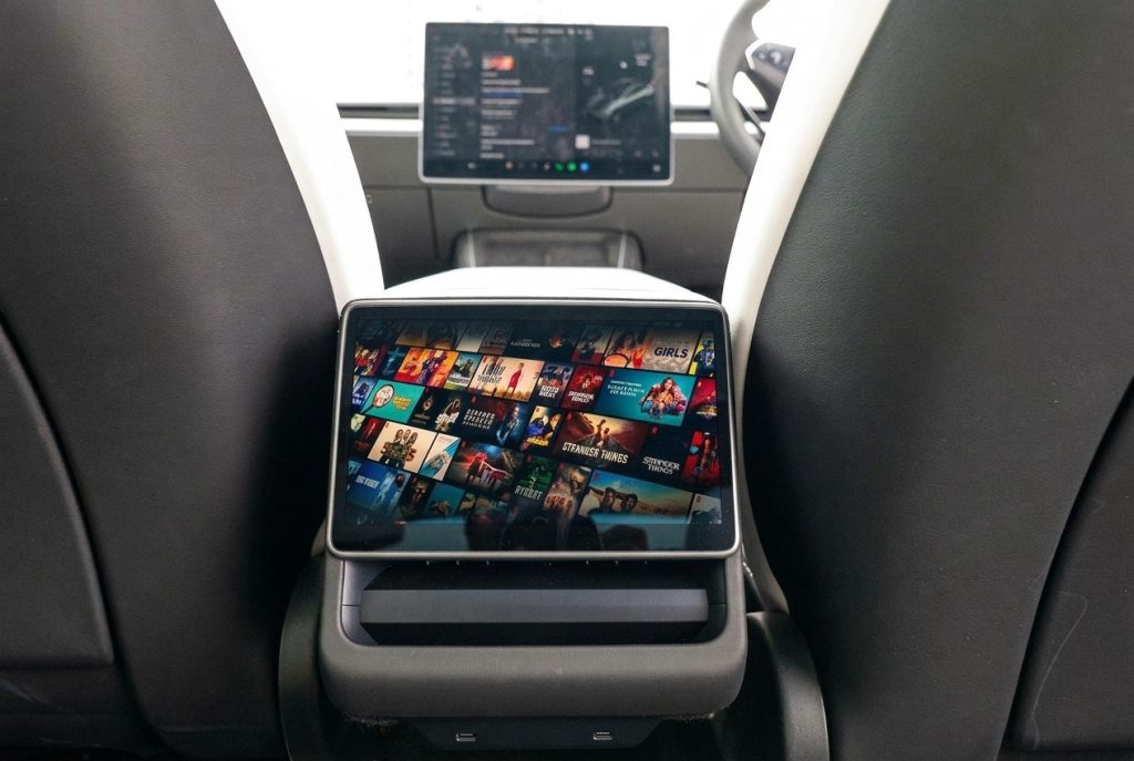 Infotainment screen of the silver 2025 Tesla Model Y RWD, available for hire in Sydney