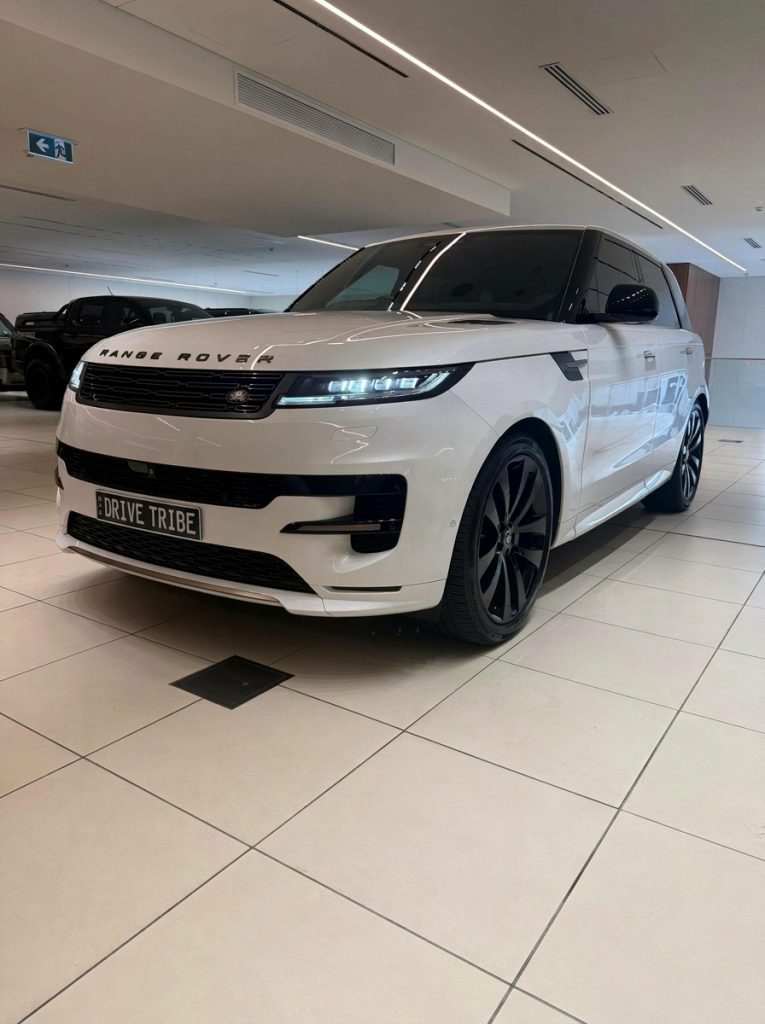 White 2024 Land Rover Range Rover Sport D300 SE Dynamic, front three-quarter view, available for hire in Sydney