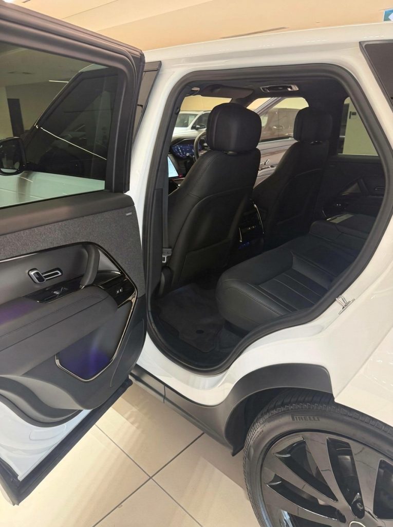 Rear seats of the white 2024 Land Rover Range Rover Sport D300 SE Dynamic, available for hire in Sydney