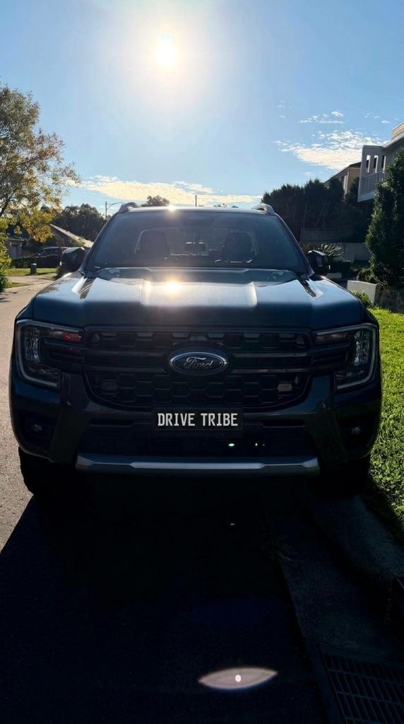 Grey 2022 Ford Ranger Wildtrak 4x4, front view, available for hire in Sydney