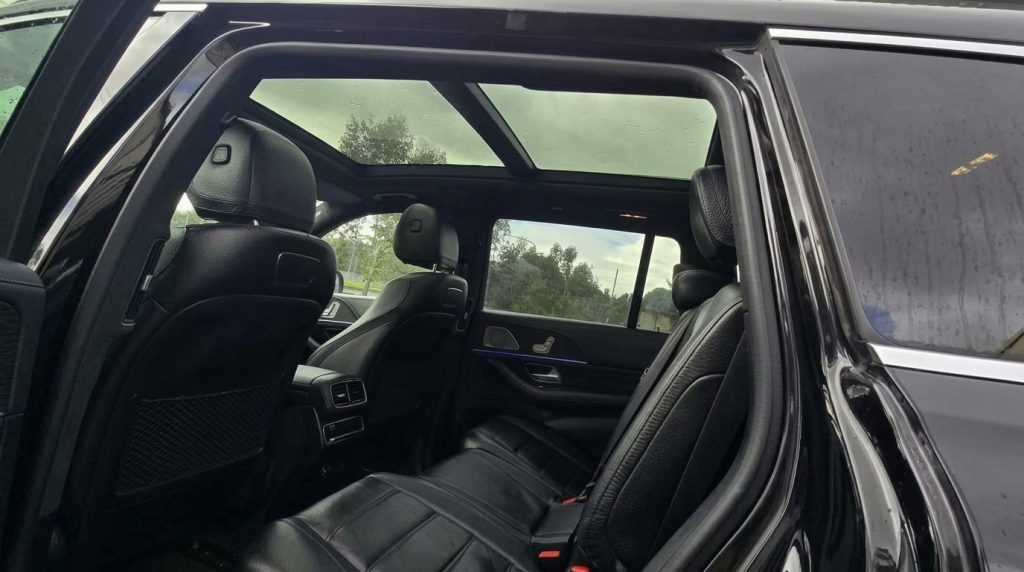 Rear seats of the black 2019 Mercedes-Benz GLS, available for hire in Sydney